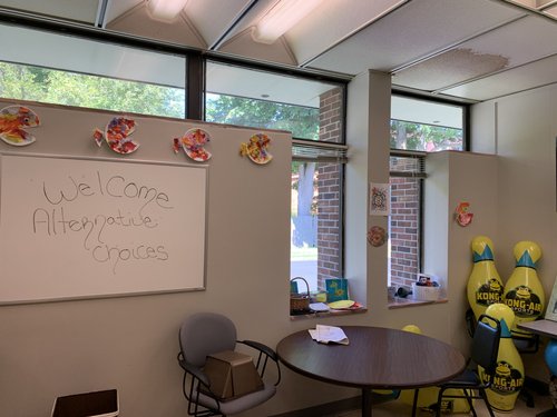 Indoor common area with a welcome message
