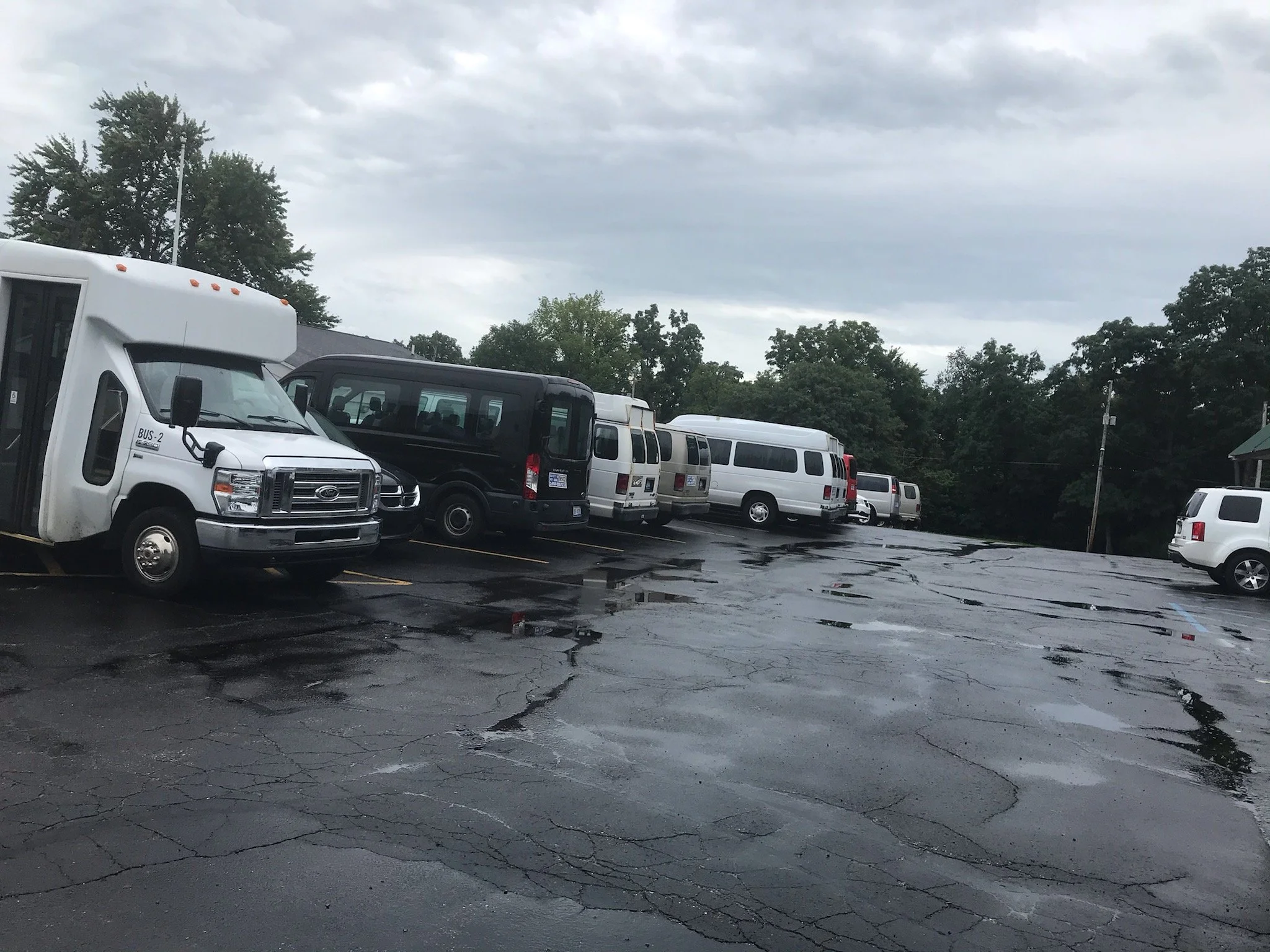 Parking area with facility vehicles