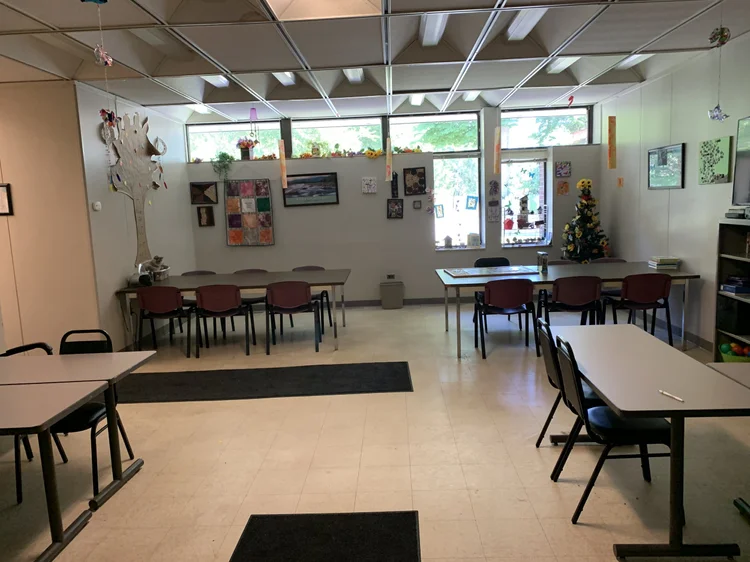 Bright and inviting common area with seating.