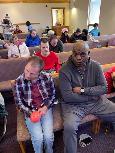 Residents engaged in a common area activity.