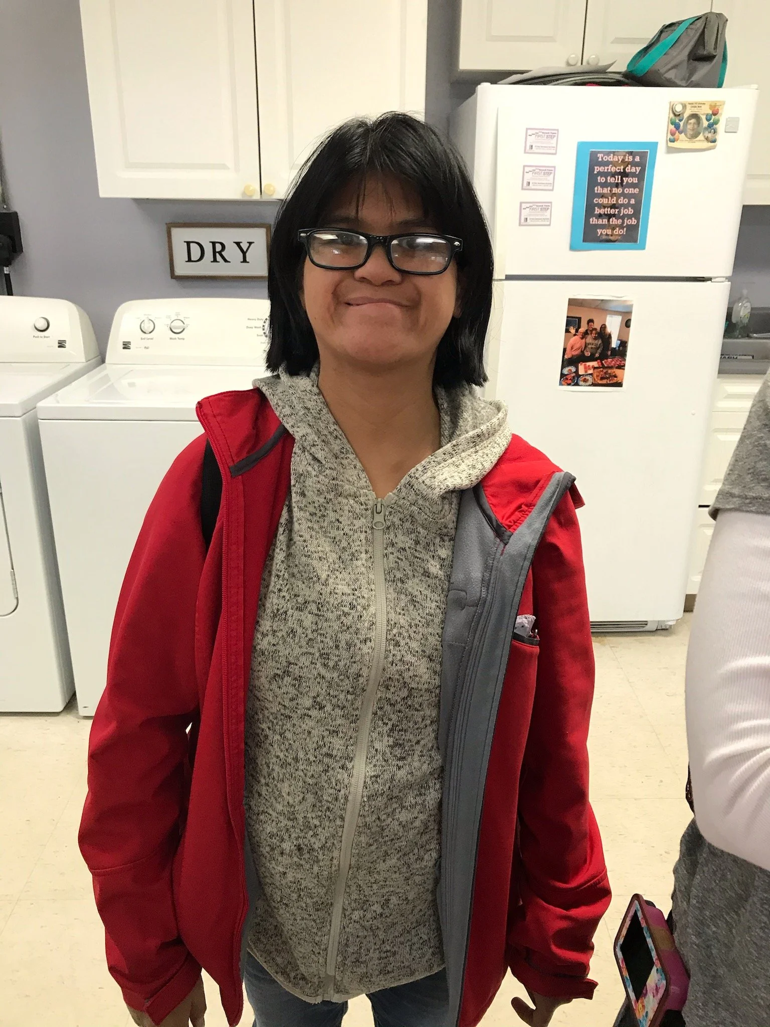 Resident smiling in a common area
