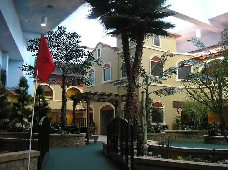 Interior courtyard with plants and seating areas