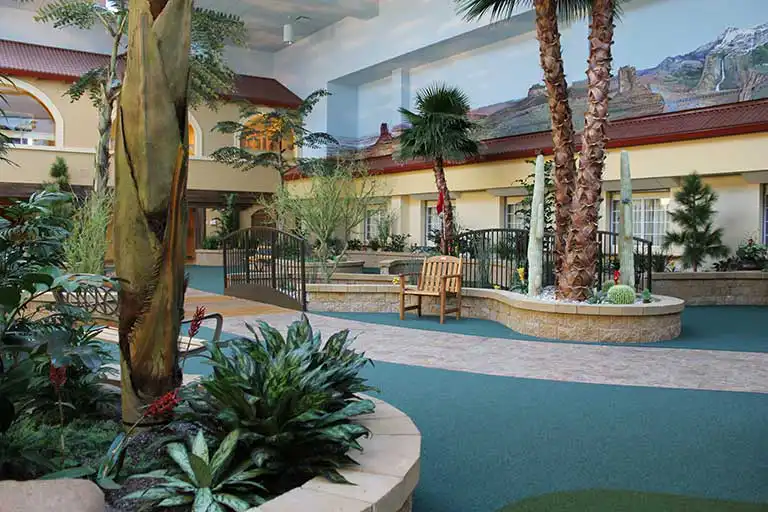 Indoor garden area with plants and seating