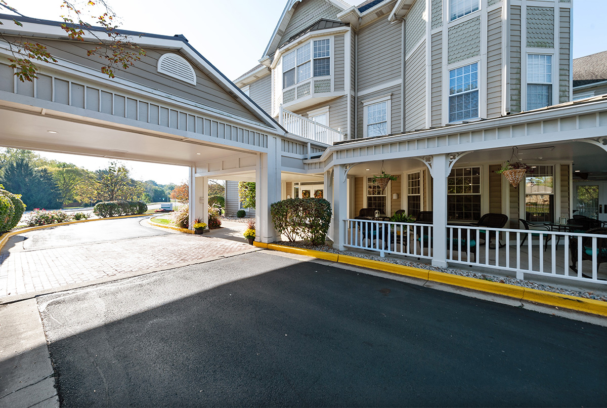Front entrance of Kesslerwood Place with landscaping.