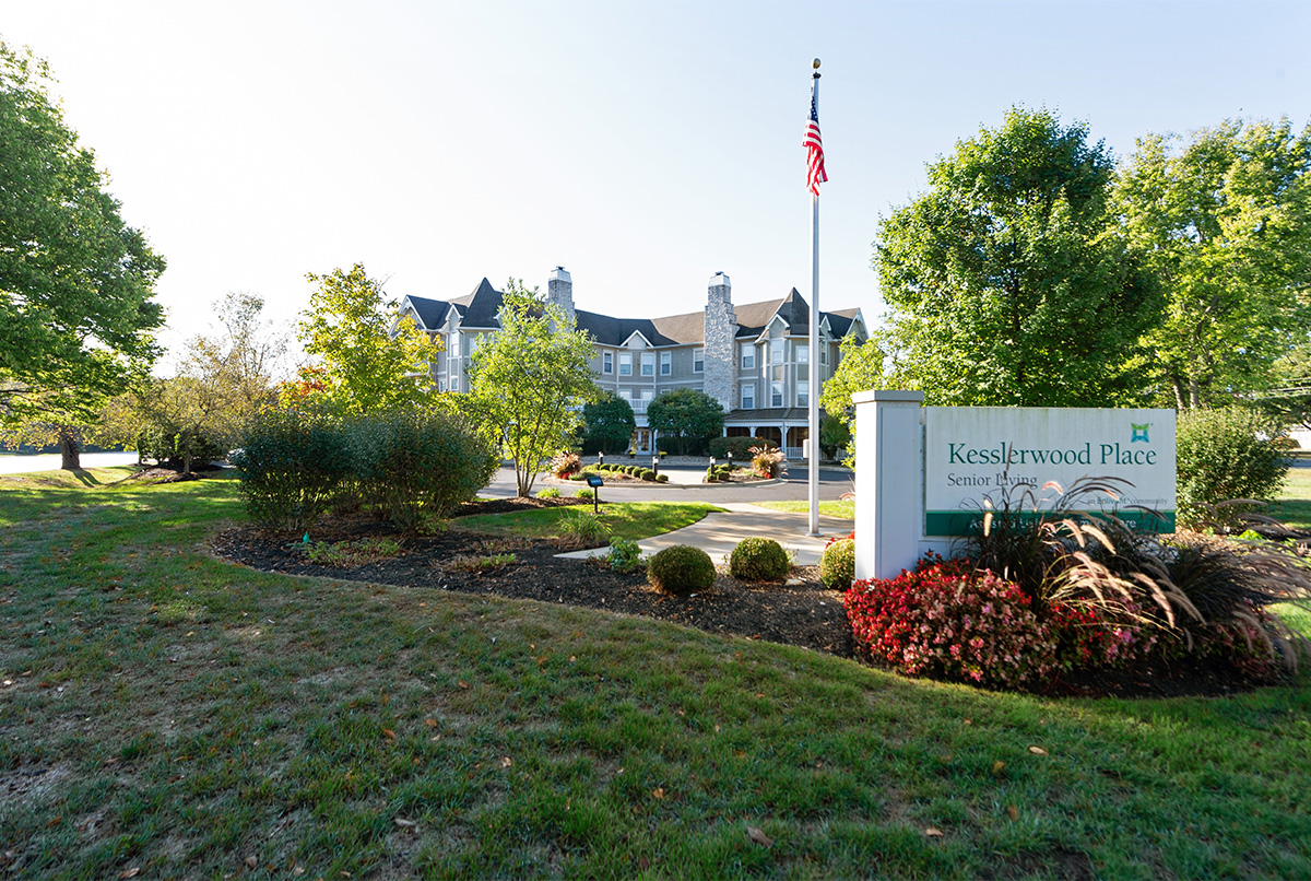 Exterior view of Kesslerwood Place with landscaping.