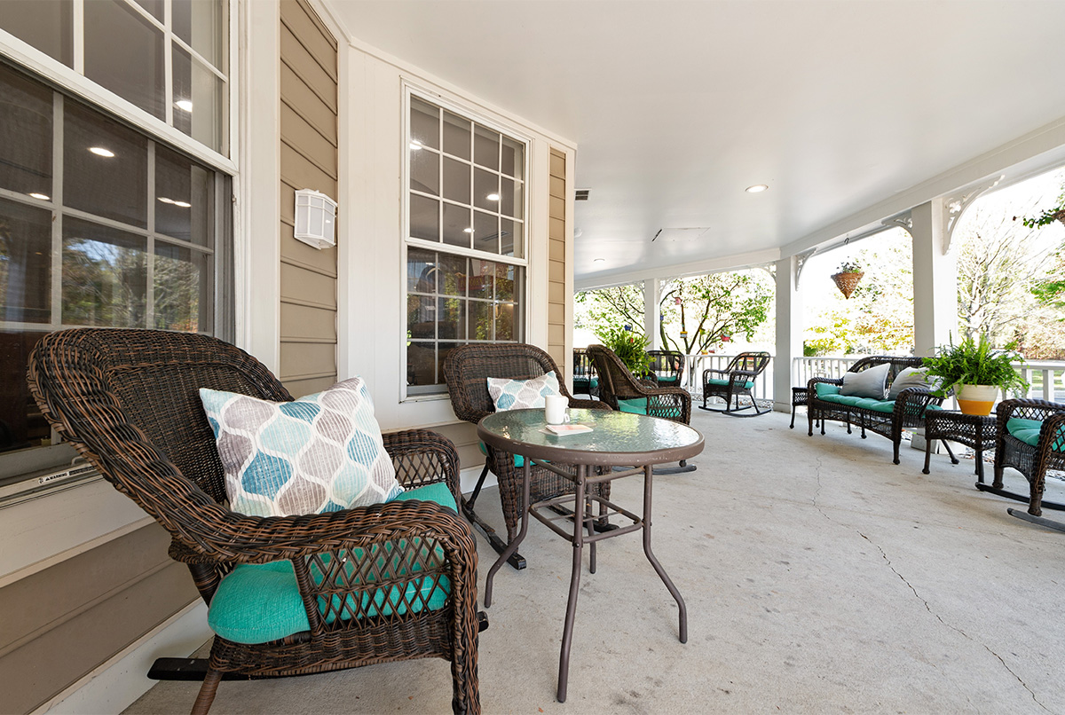 Cozy outdoor seating area with wicker chairs