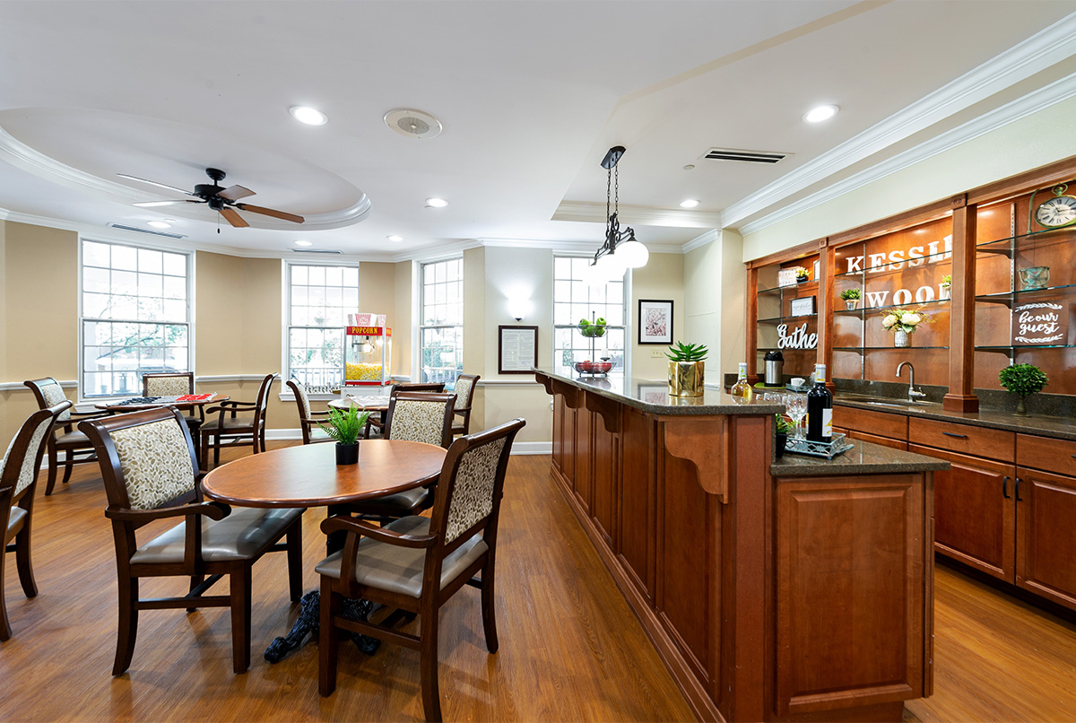 Dining area with tables and a service counter.