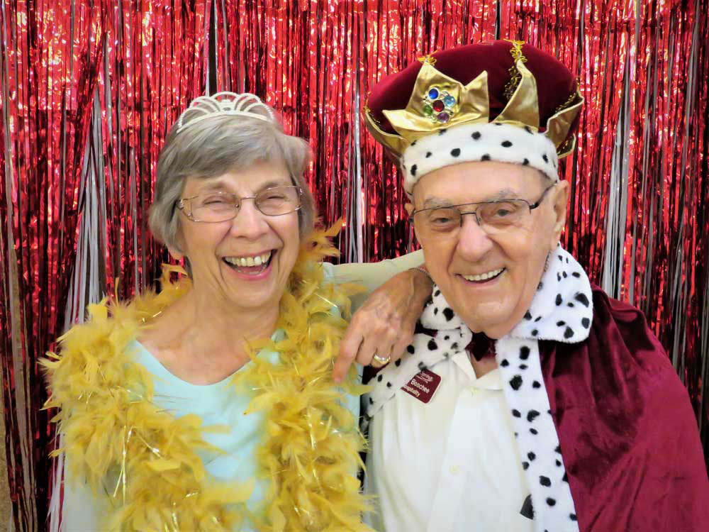 Residents celebrating with costumes at a party.