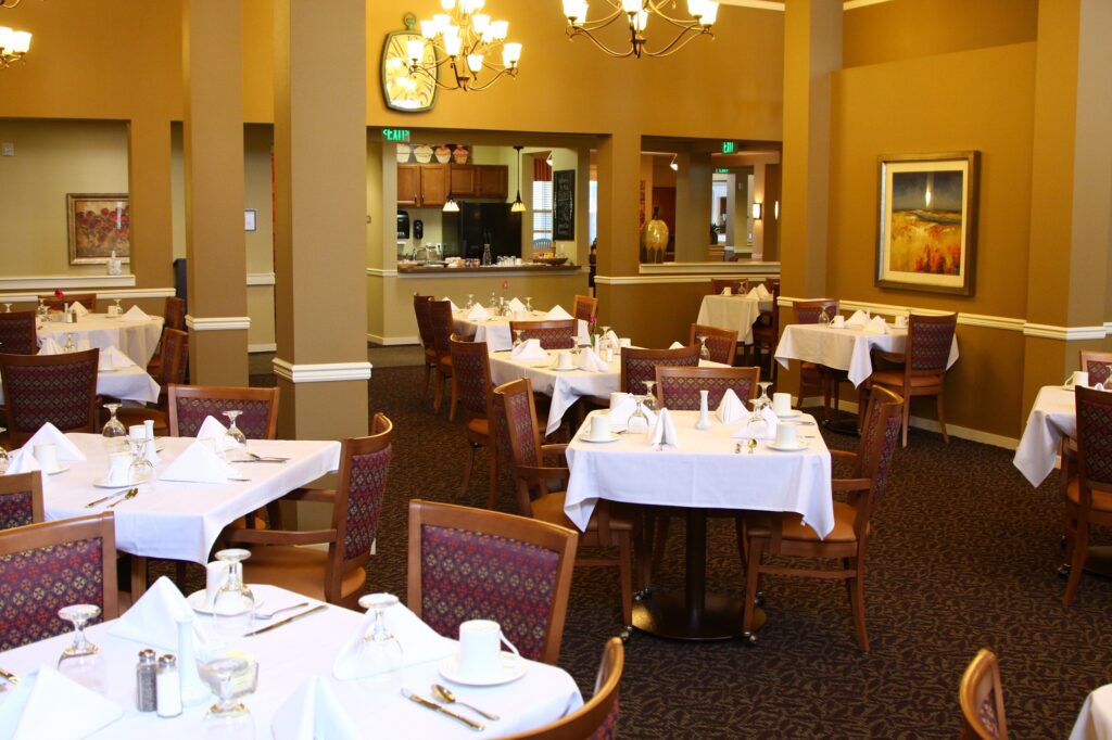 Dining area with elegantly set tables