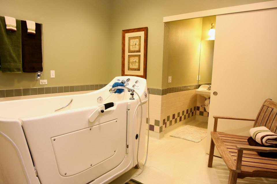 Accessible bathroom with tub and seating