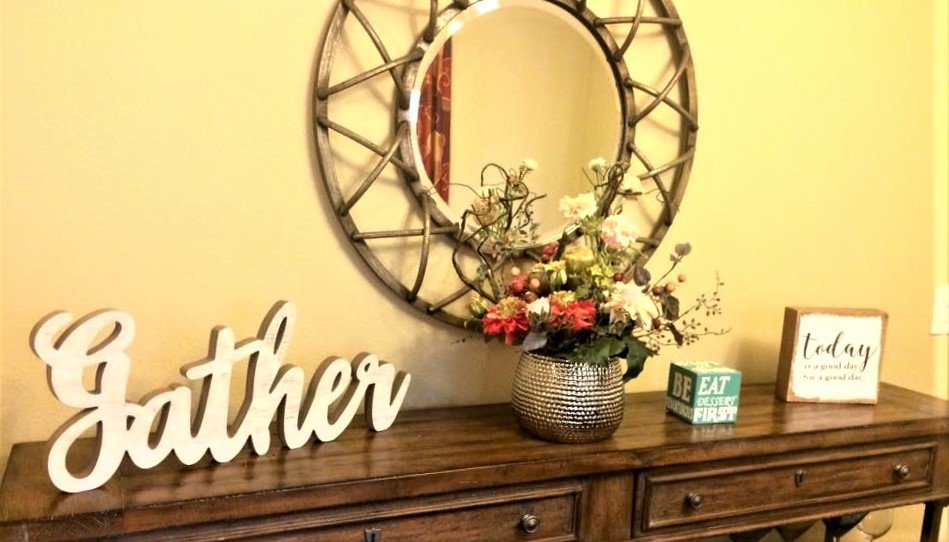 Decorative interior with flowers and sign