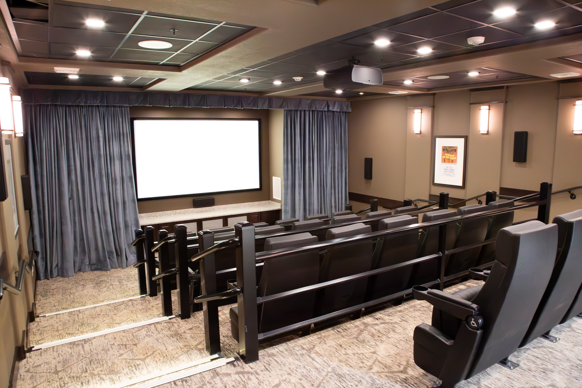 Interior of a theater-style room with seating