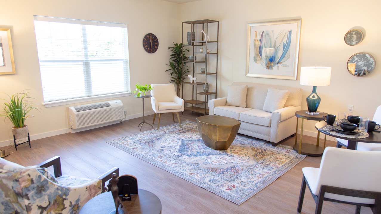 Cozy living room area with furniture and decor.