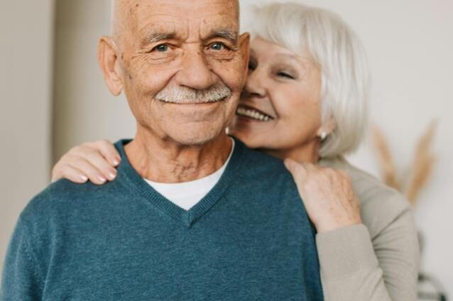Happy senior couple smiling together