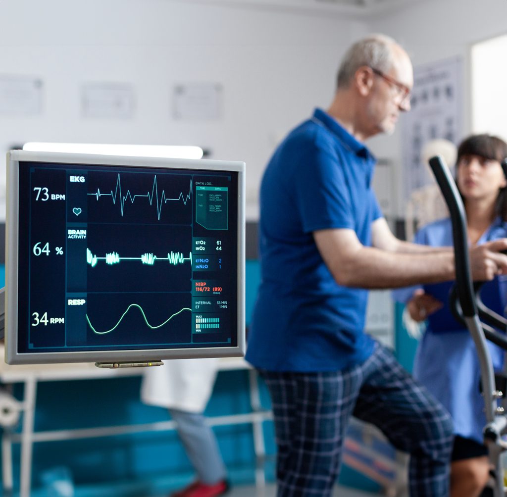 Medical equipment with healthcare professionals in background