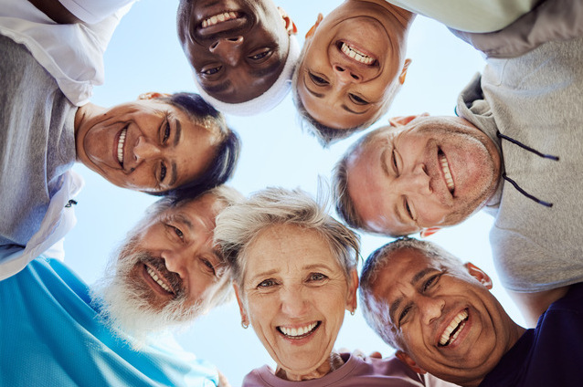Group of smiling residents outdoors