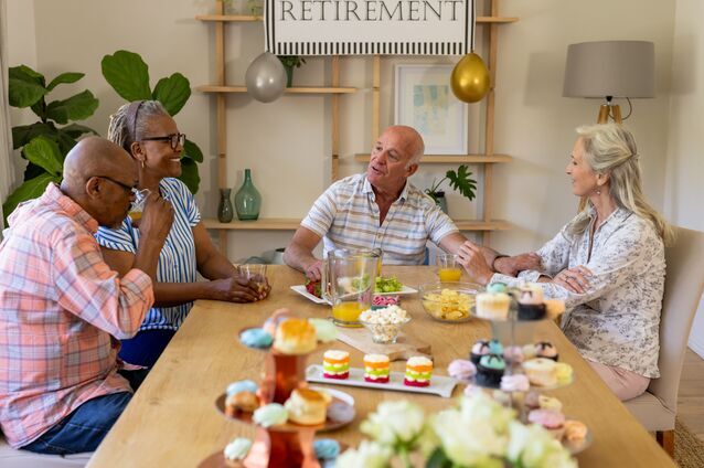 Residents enjoying a celebratory meal together.