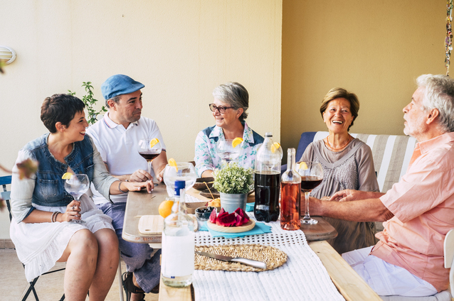 Group of people enjoying drinks outdoors
