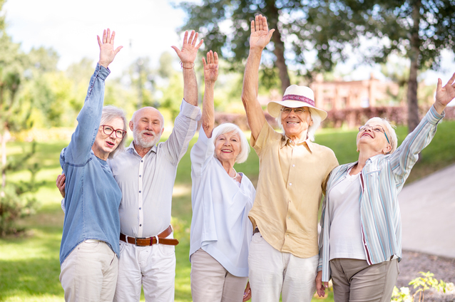 Group of smiling seniors enjoying the outdoors