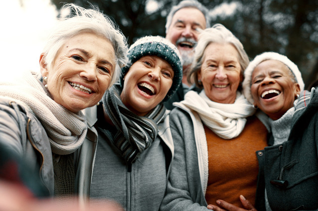 Group of smiling seniors enjoying time together