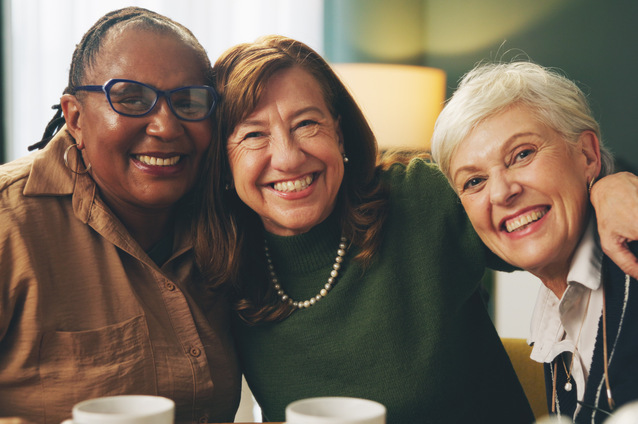 Three smiling women enjoying time together