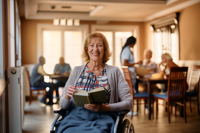 Senior woman reading in a community area