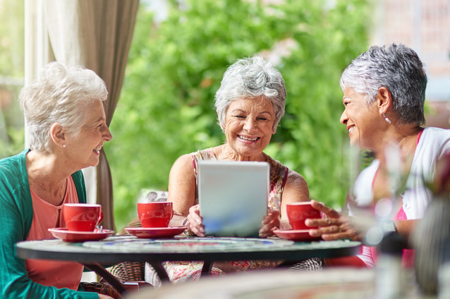 Three seniors enjoying time together outdoors