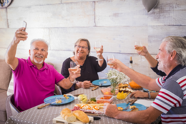Seniors enjoying a toast at a gathering