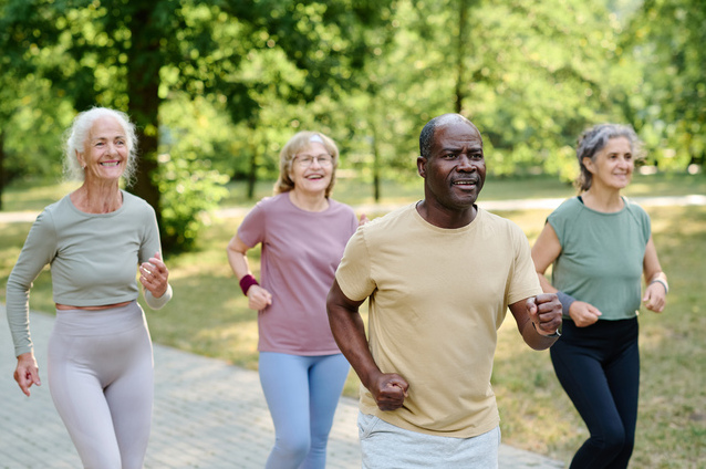 Group of residents jogging in a park.