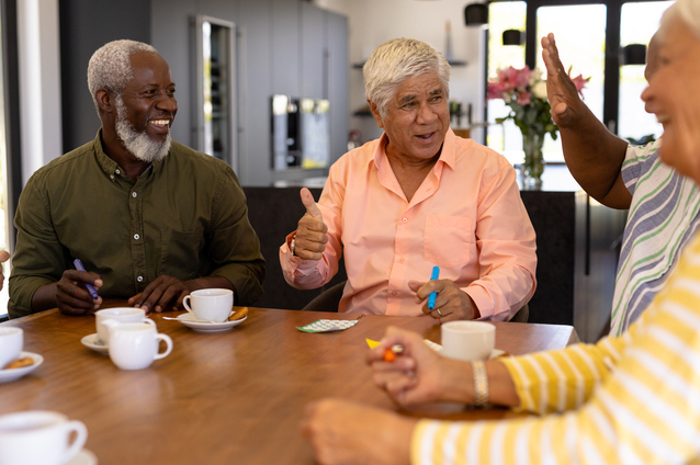 Residents engaging in a group activity at a table