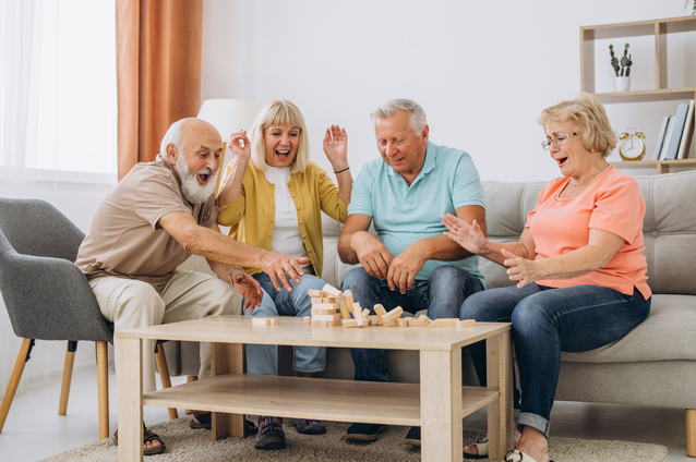 Residents engaging in a fun activity together indoors.