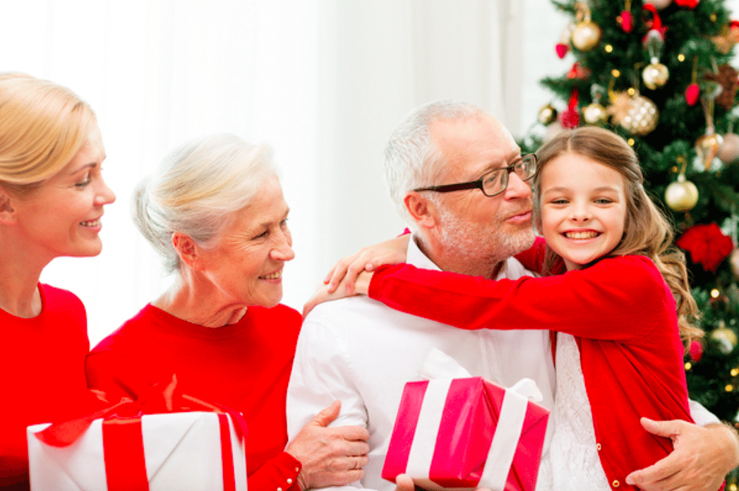 Family members celebrating together during the holidays.