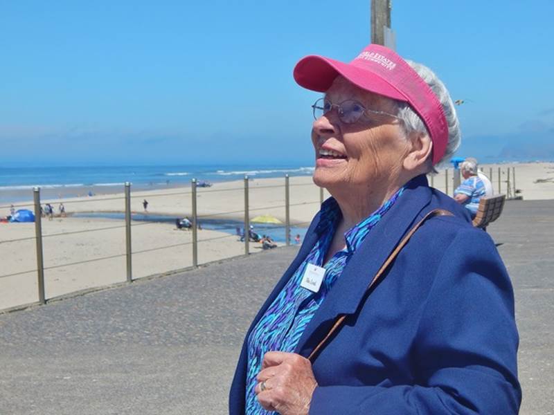 Senior woman enjoying a day at the beach.