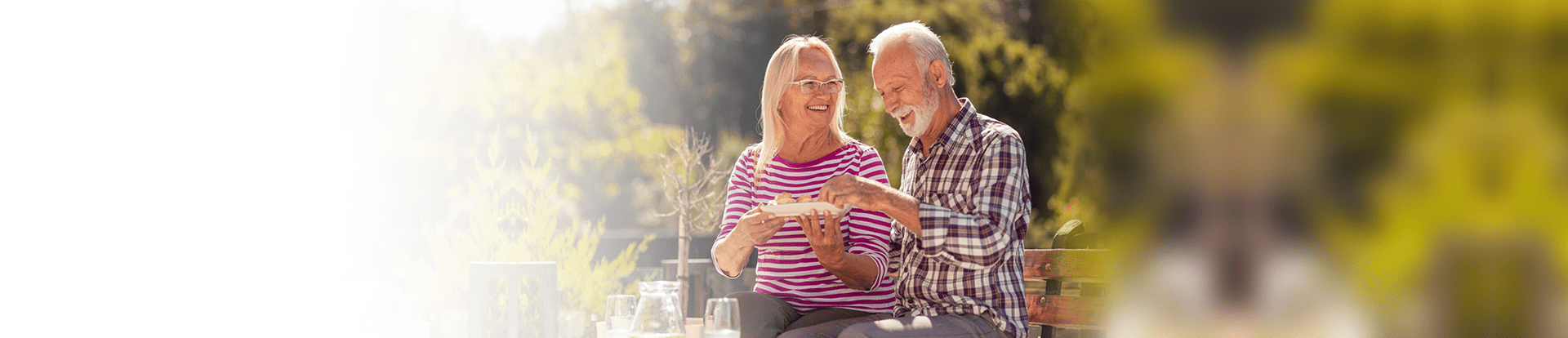 Happy elderly couple enjoying time outdoors
