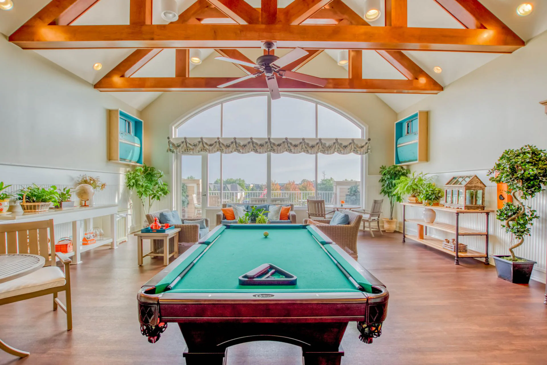 Interior common area with a pool table and seating