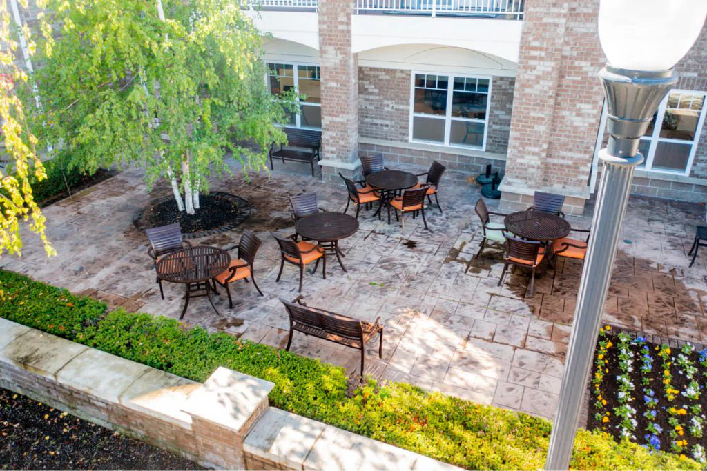 Outdoor seating area with tables and chairs