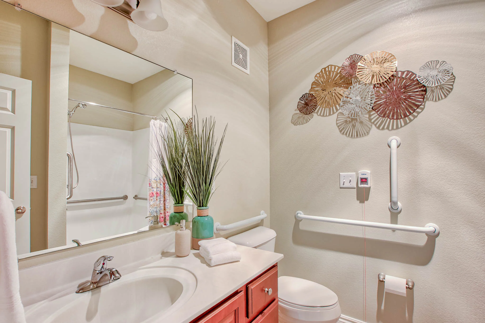 Stylish bathroom with decorative wall art