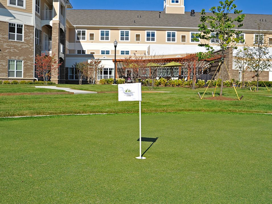 Outdoor space with facility building in background.