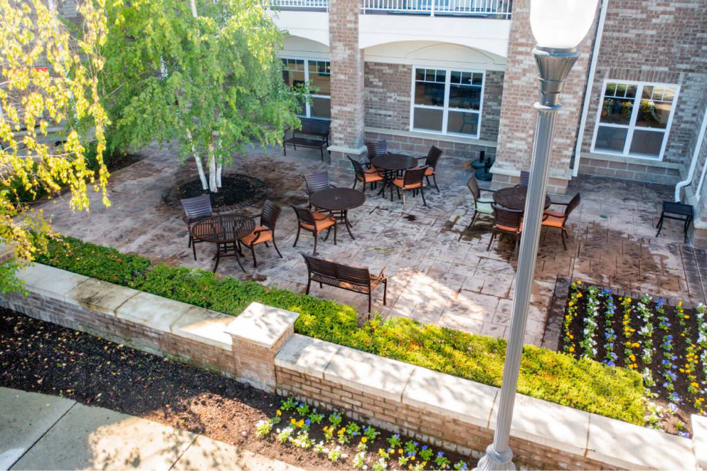 Outdoor seating area with tables and chairs