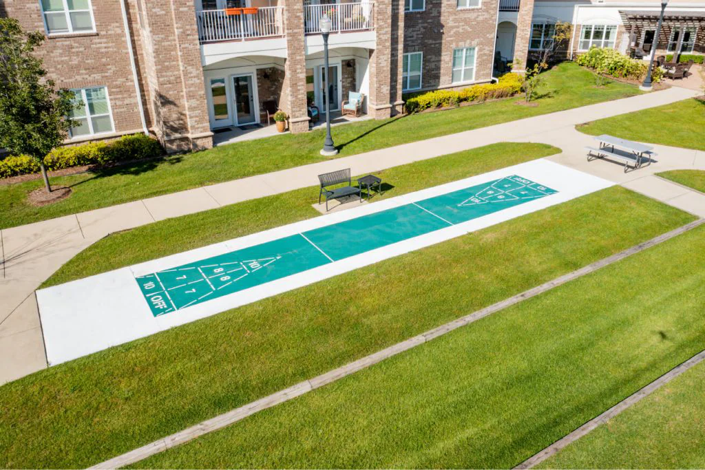 Outdoor shuffleboard court near the facility