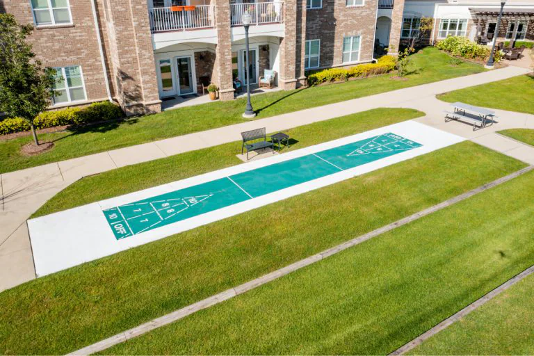 Outdoor shuffleboard court in a green space