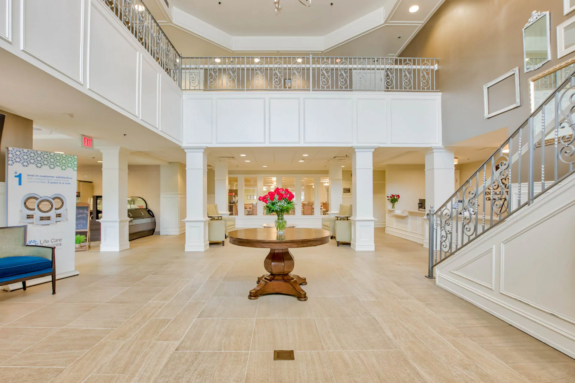 Bright interior lobby with flowers and seating area