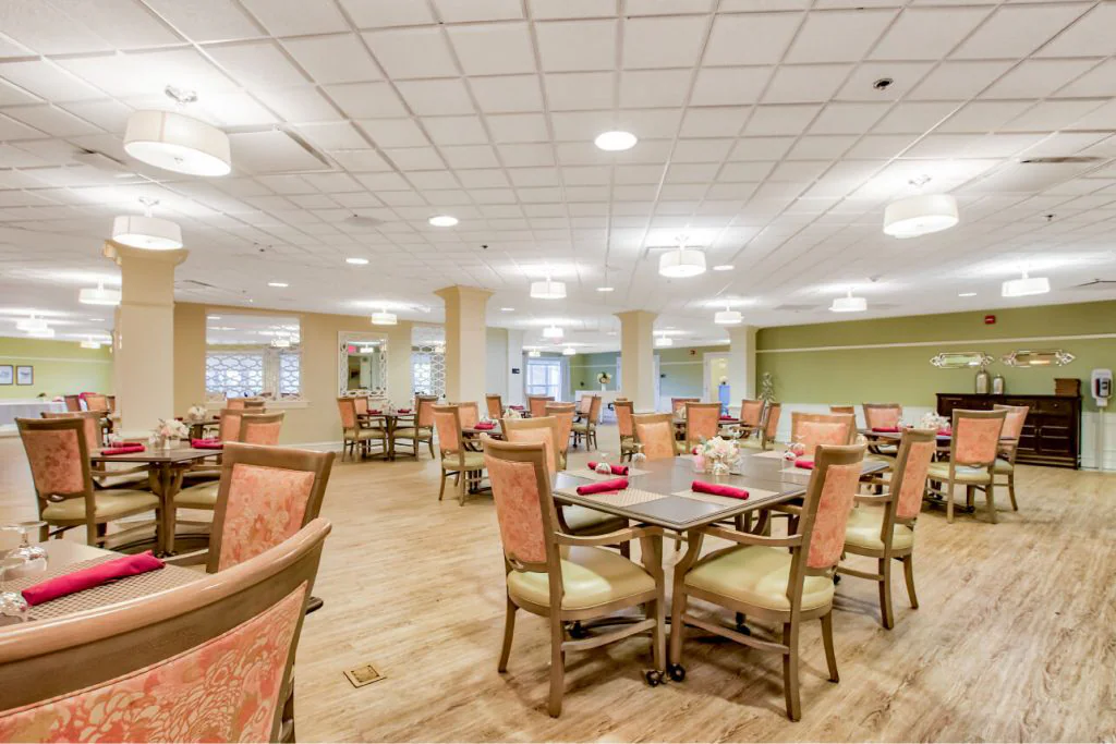 Stylish dining area with tables and chairs.