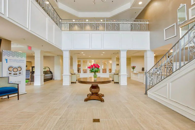 Lobby area with elegant decor and flowers