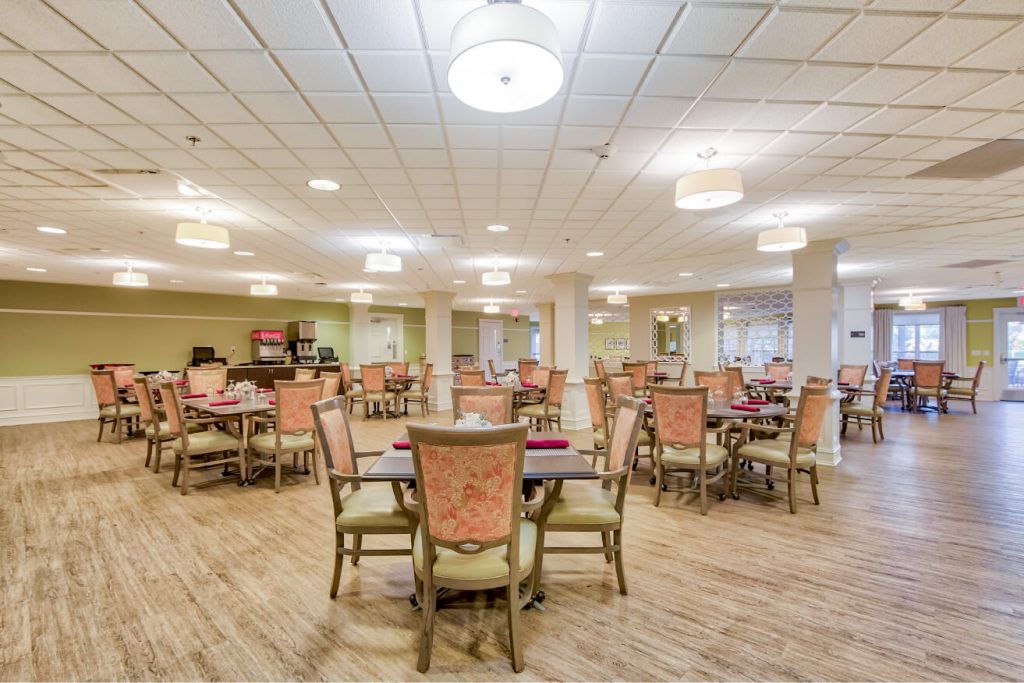Dining room setup with tables and chairs