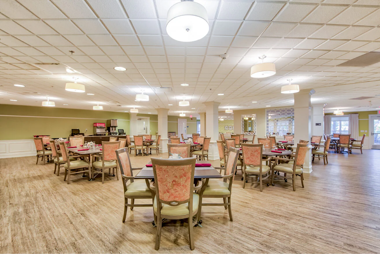 Bright dining room with tables and chairs