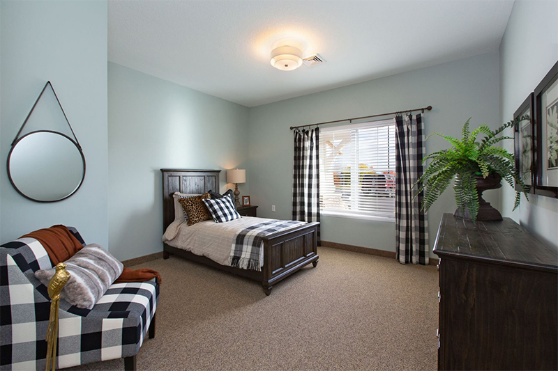 Cozy private resident room with a bed and decor