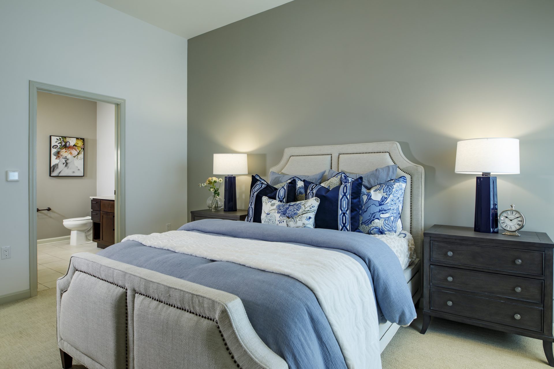 Cozy resident bedroom with decorative bedding