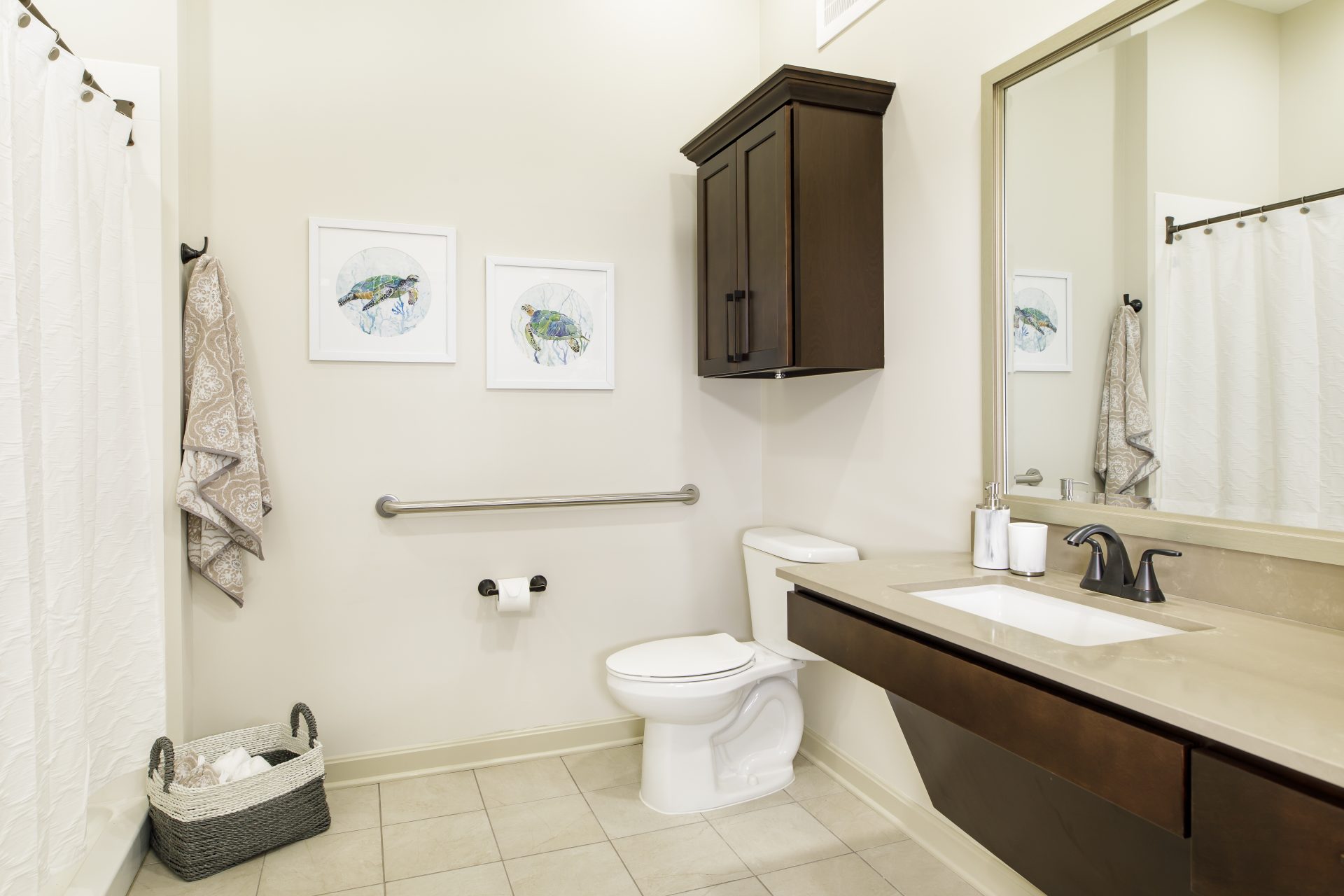 Clean, modern bathroom with artwork