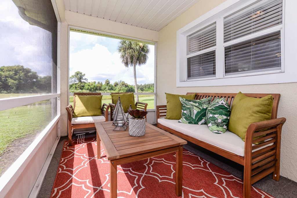 Outdoor seating area with a view of greenery
